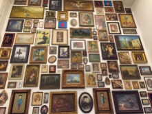 Up close wall of paintings